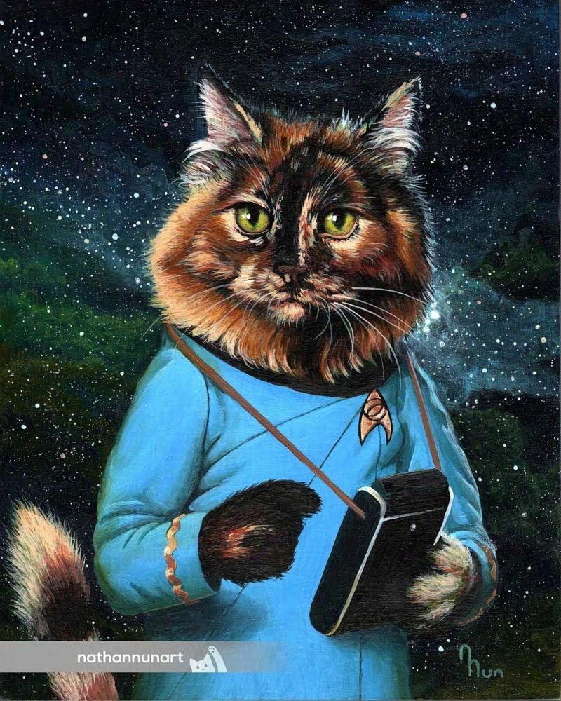A painted portrait of a cat wearing a blue Star Trek uniform - original series era. Behind them is a colourful gases and stars. 