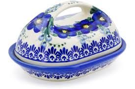 blue wildflower art decorates a butter dish