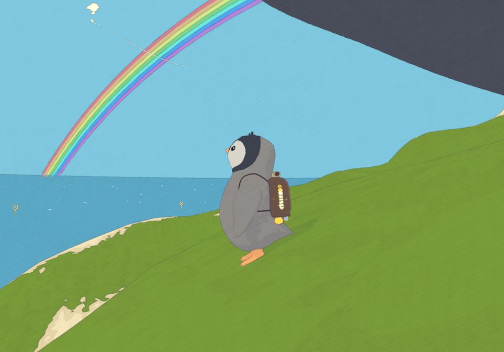 Penguin looks out at the ocean.