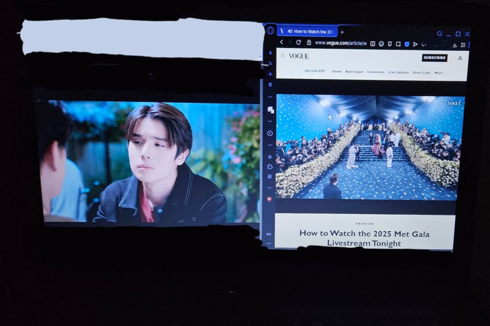 a screen showing a young man looking at someone on the left; on the right is a long shot of the Met Gala carpet 