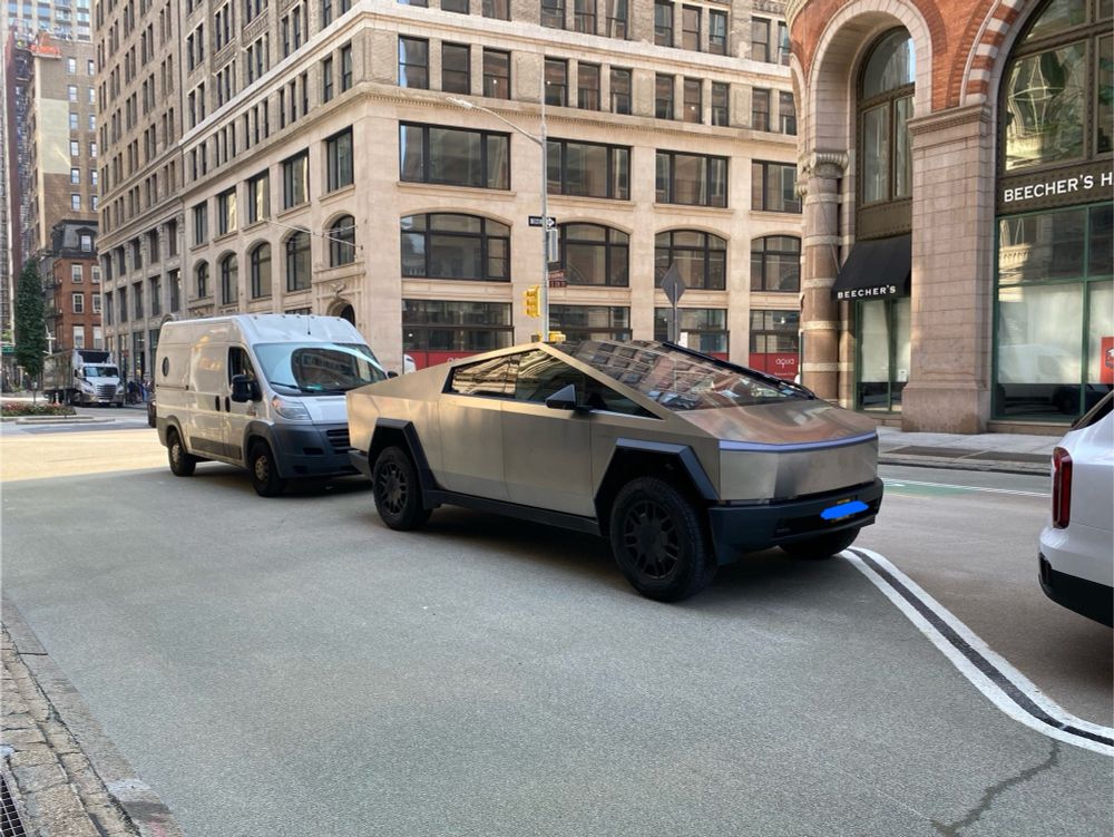 Tesla Cybertruck, illegally parked in a pedestrian plaza on Broadway in NYC near 20th street.