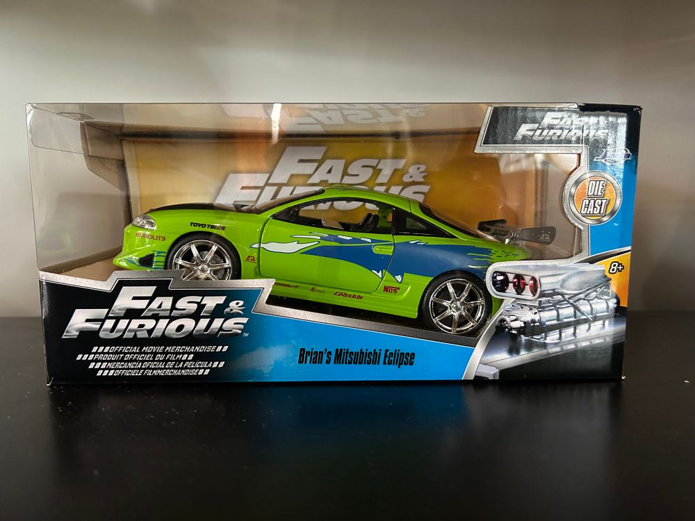 Brian’s green with blue details Mitsubishi Eclipse from the first The Fast and The Furious movie. 