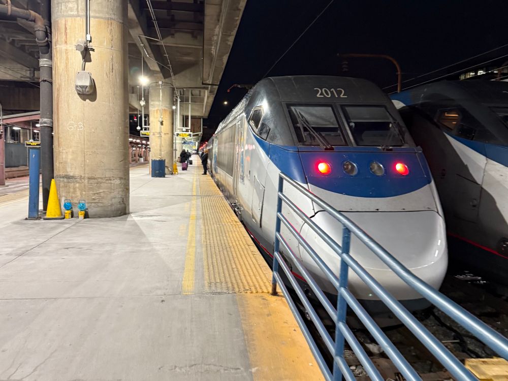Early morning photo of an Amtrak Acela train at the platform at Union Station in Washington, DC.