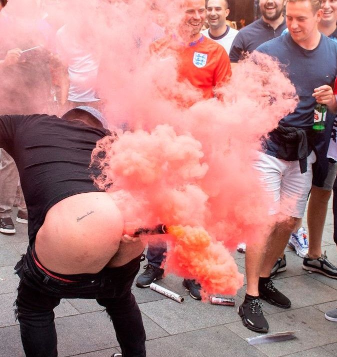 That famous pic of an England fan with an orange smoke flare up his bum