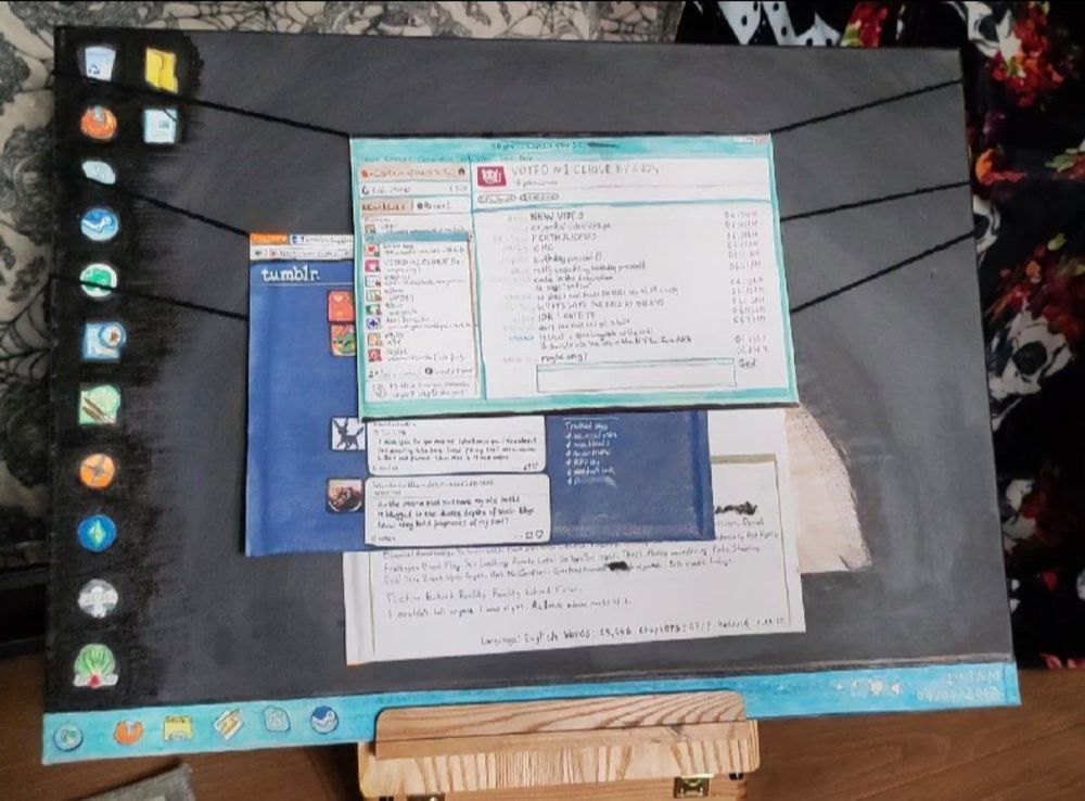 A canvas painted to look like a windows 7 desktop background. There are folded canvases hung on it with yarn that look like Skype, Tumblr, and archive of our own browser windows.