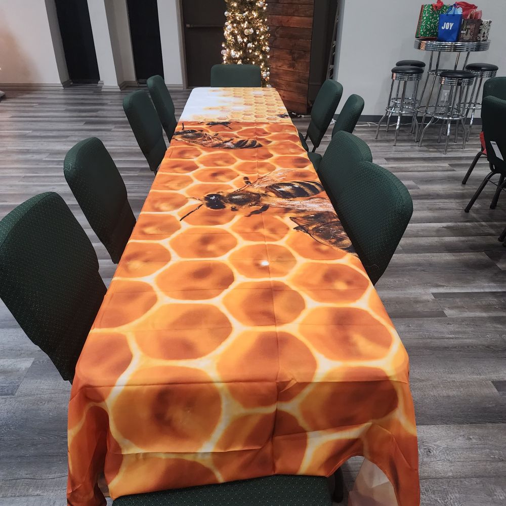 A honey comb and bee table cloth. 