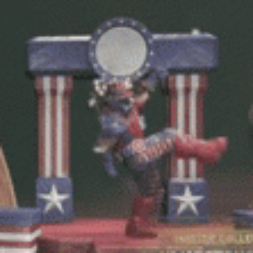 a statue of captain america is standing in front of a podium