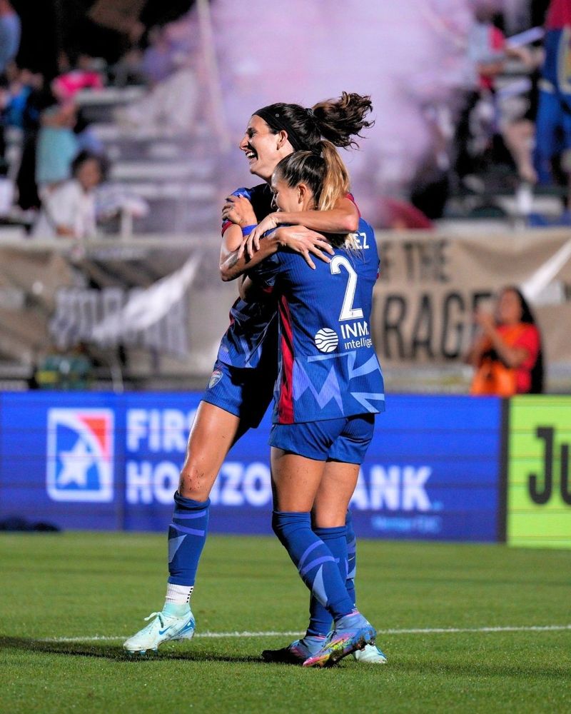 Ryan Williams and Ashley Sanchez celebrate after Ashley's goal