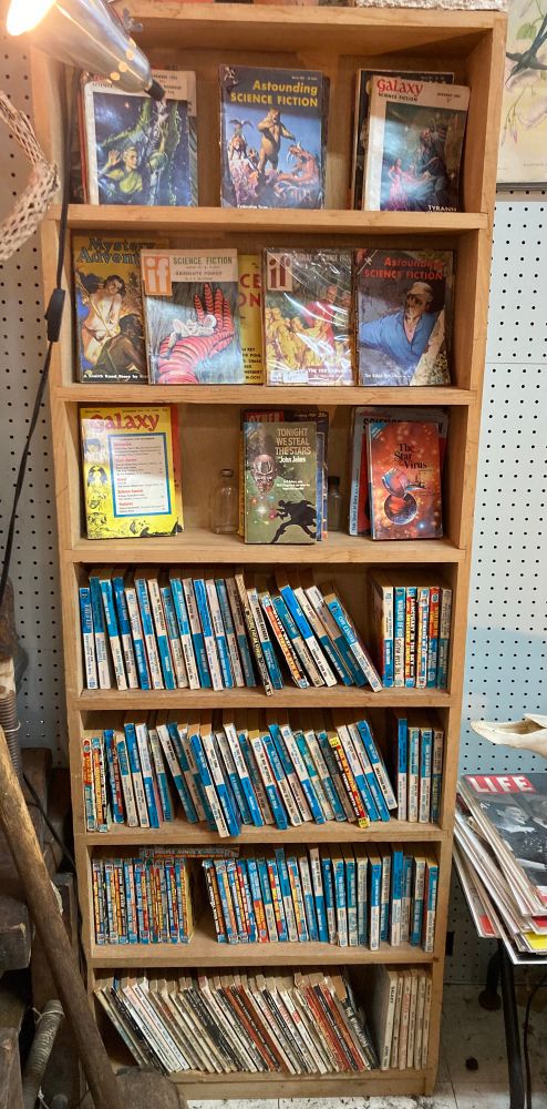 Shelves full of vintage sci-fi treasure