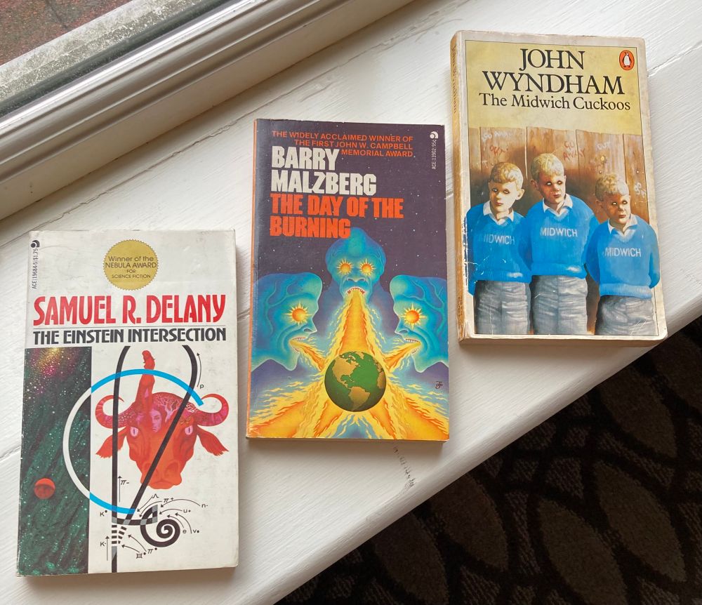 The three books that I purchased - Delaney's Einstein Intersection, Malzberg's The Day of the Burning, and Wyndham's The Midwich Cuckoos 