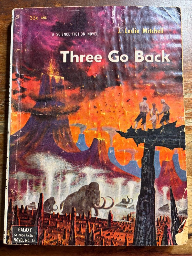 Three Go Back by J. Leslie Mitchell.   1953, cover art by Richard Powers. 

3 people atop stone archway watching wholly mammoths approaching from a range of volcanoes. 