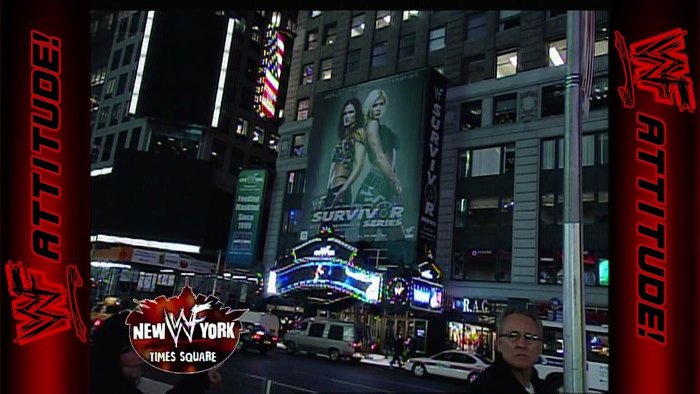 A view of WWF New York from the street in New York City. Cars line the streets, and a marquee advertises Survivor Series. The edges of the image read "WWF Attitude!"