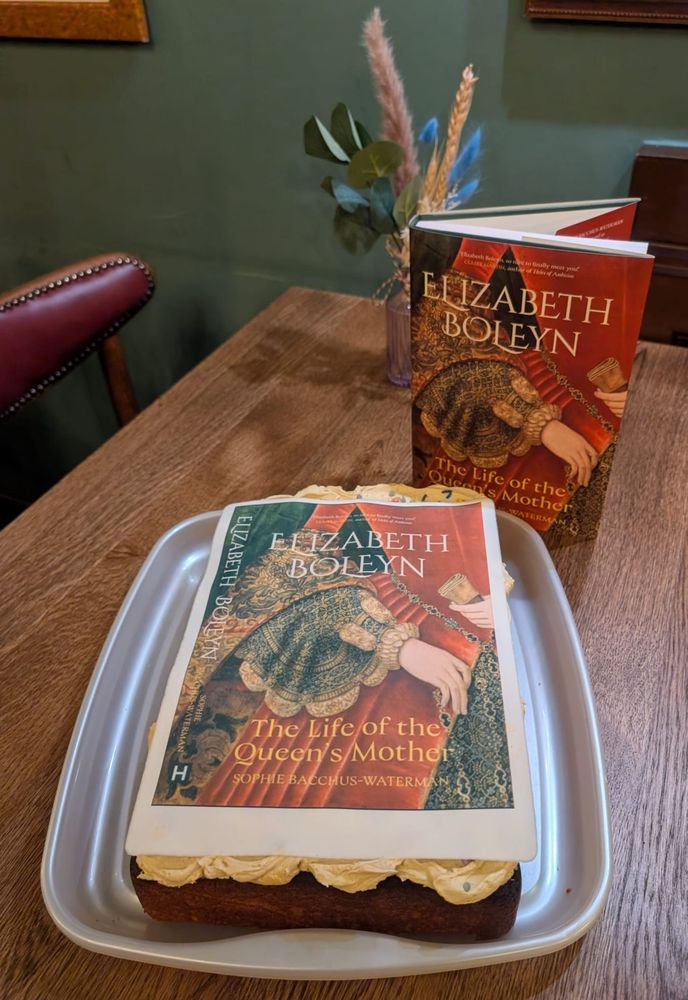 Photo of a cake with my book on it 
