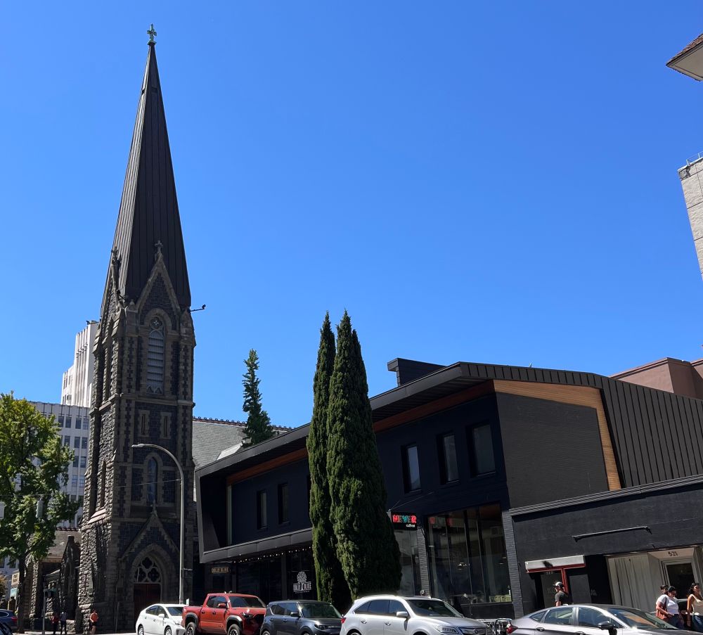 a beautiful church in downtown portland oregon in crisp and cloudless blue skies 