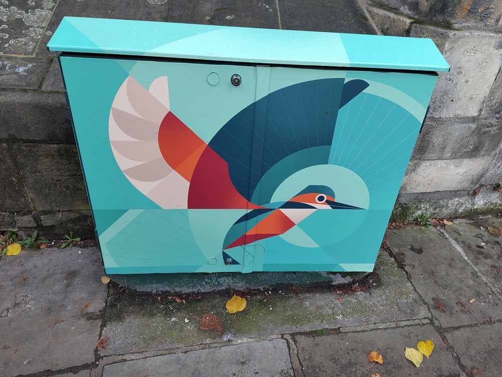 Art piece of a kingfisher in a blocky style