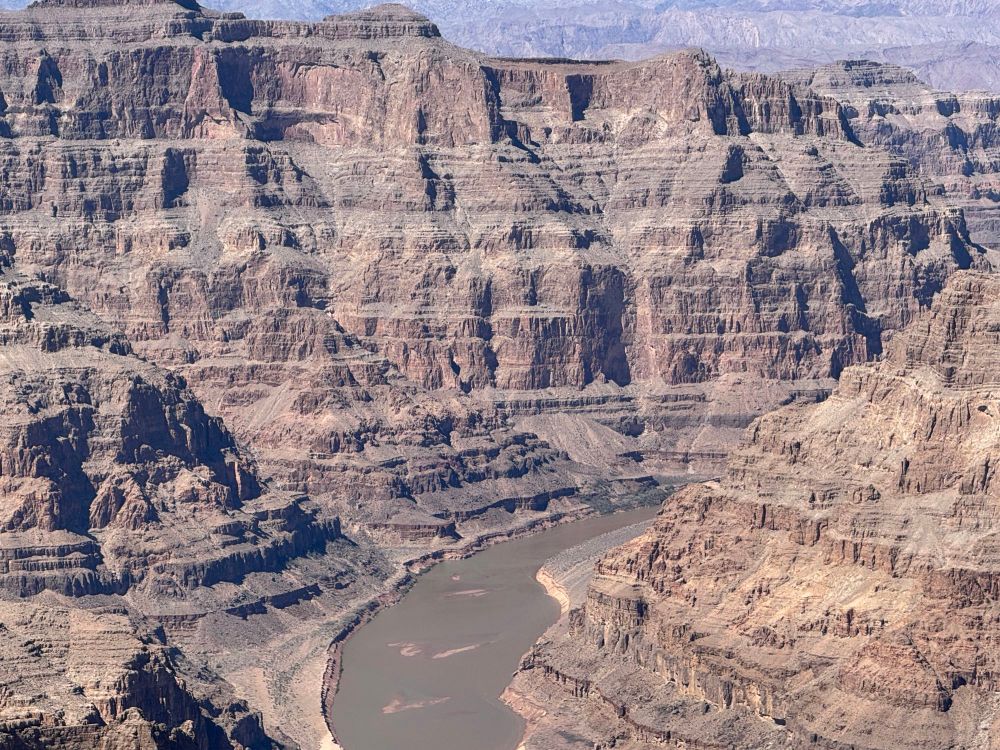 The Colorado River runs 3800 feet below the top of the canyon