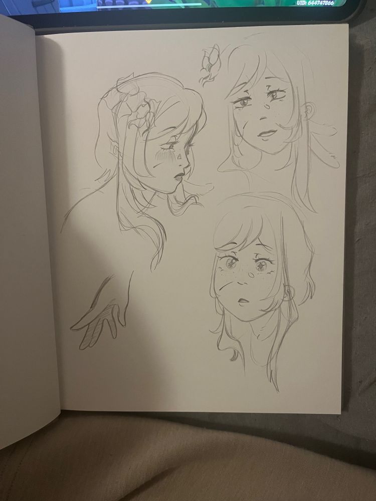 Sketch page of Lumine from Genshin Impact with multiple expressions