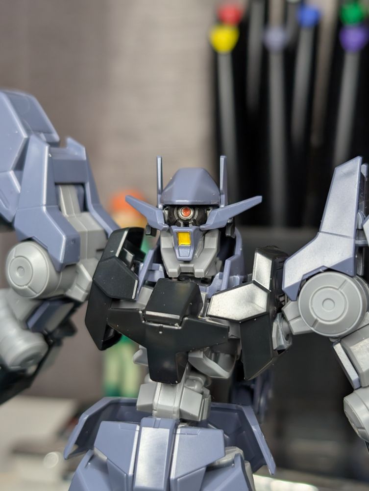 HG Graze Ein closeup of head with previous eye down exposing second eye. Idk what is up with the eyes on these things but I love them. On the normal graze it just feels kinda cool and neat and tactical or smth, but on the Ein is feels like a horrific mouth that is going to devour you for the collective. All will be assimilated 