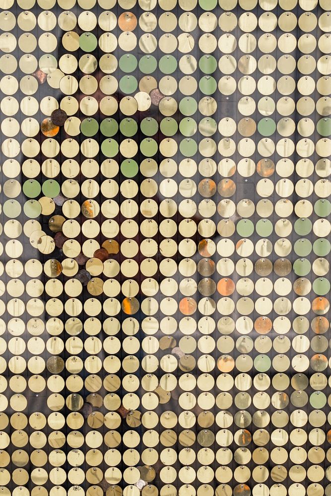 A close up encounter of decoration on Brighton Pier. It’s made up of rows of, what I can only describe as dog tag. They caught my eye as they were glinting beautifully in the sun and creating patterns with the various reflections within them.