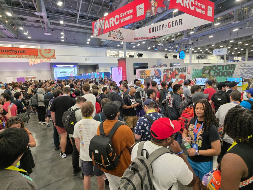 A line for the Tokon demo that wraps around the booth