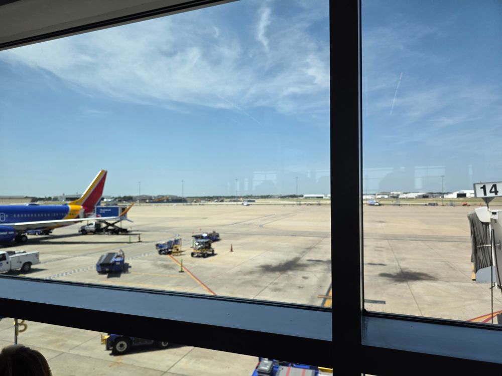 View of the airport tarmac with a southwest airplane 