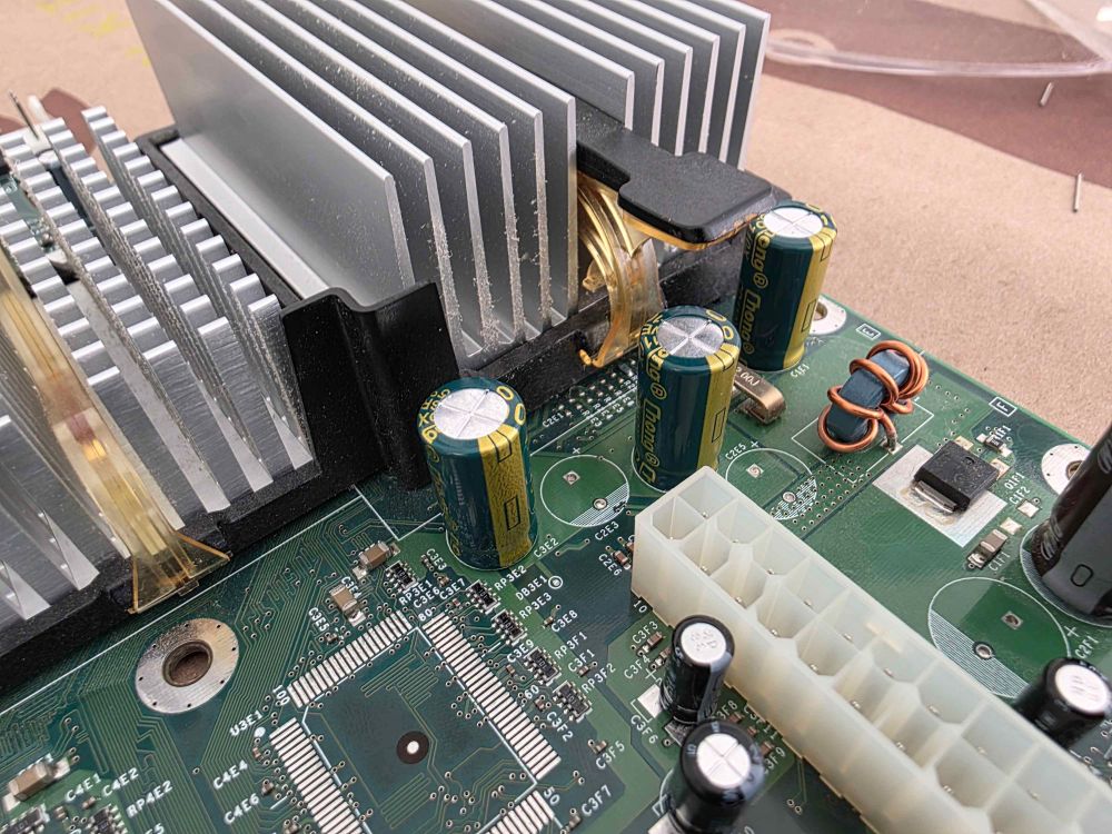 3 New Green/Yellow Capacitors near the heatsink of the CPU