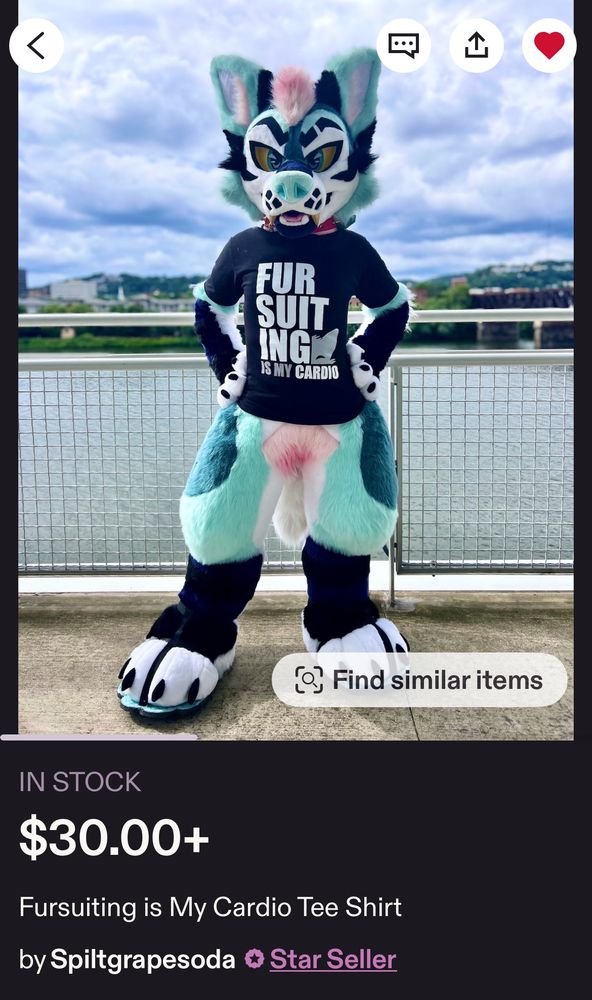 Screenshot of SpiltGrapeSoda’s Etsy listing for “Fursuiting is my cardio” modeled by a fursuiter at Anthrocon, overlooking the water in the background. For the record, I have this shirt too because it’s true!