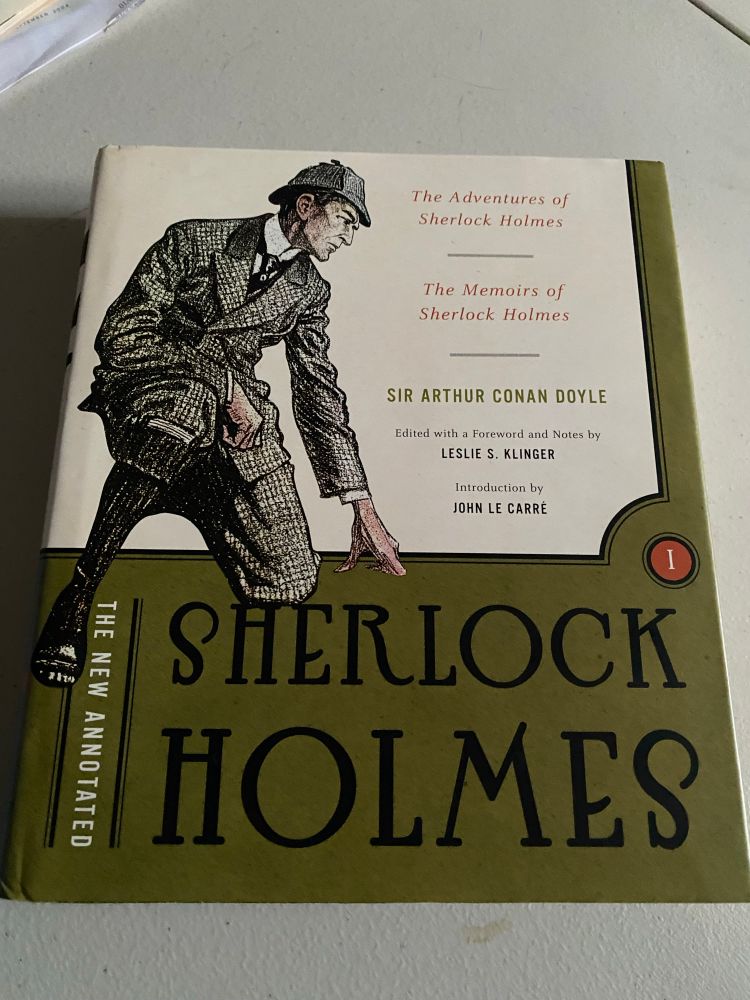 Photo of book cover of a combined volume containing _The Adventures of Sherlock Holmes_ and _The Memoirs of Sherlock Holmes_ (the Leslie Klinger New Annotated edition)