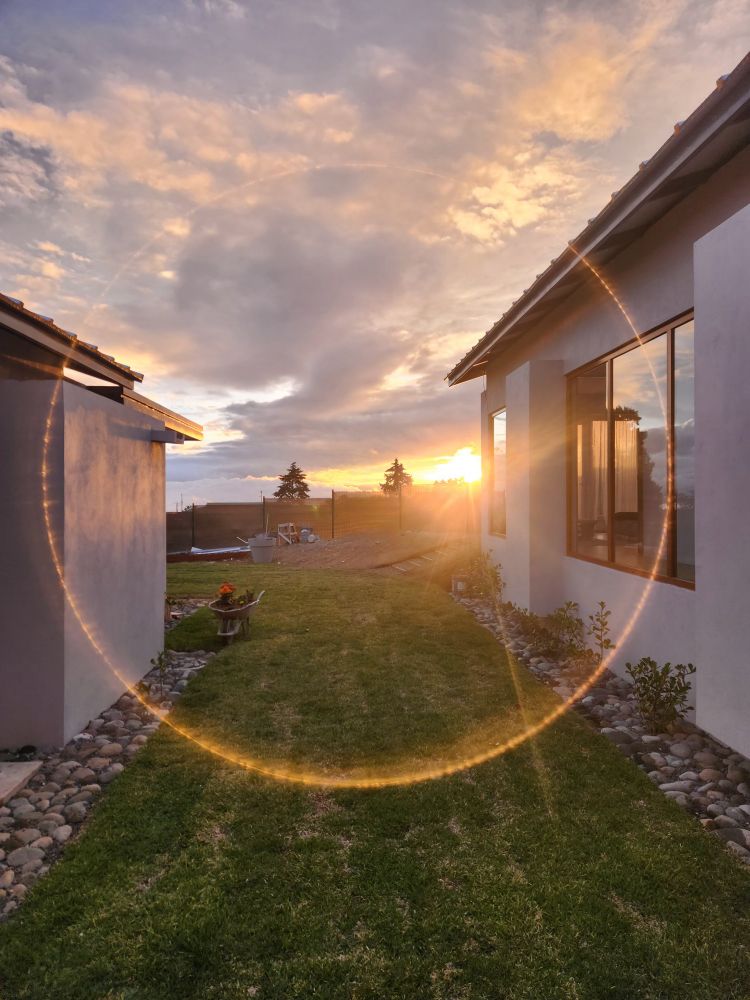 Picture of the sunset showing an artifict in the form of a glowing ring around the center of the frame