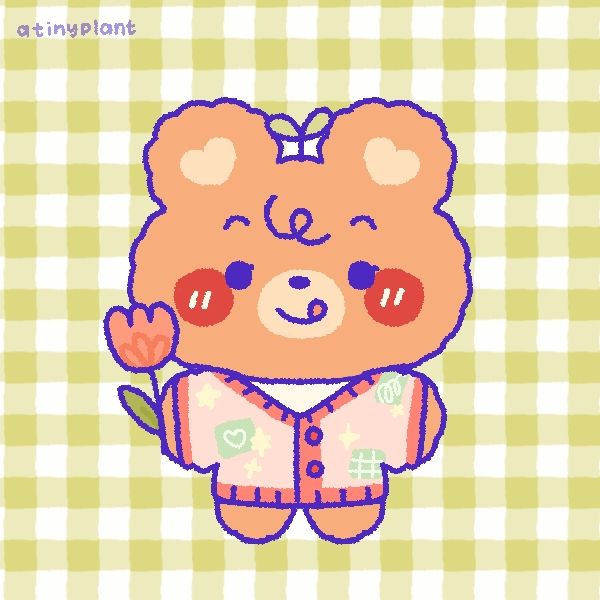 An illustration of a fluffy orange bear with leaves on its head smiling while sticking its tongue out. It's wearing a pink cardigan with green patches, white stars, and a red trim while holding a pink flower. The bear is over a green gingham background. In the top left corner of the image is purple text that reads "atinyplant."