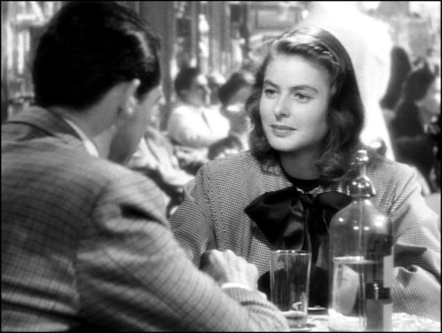 A still image of Ingrid Bergman and Cary Grant in conversation in a scene from the film NOTORIOUS (1946)