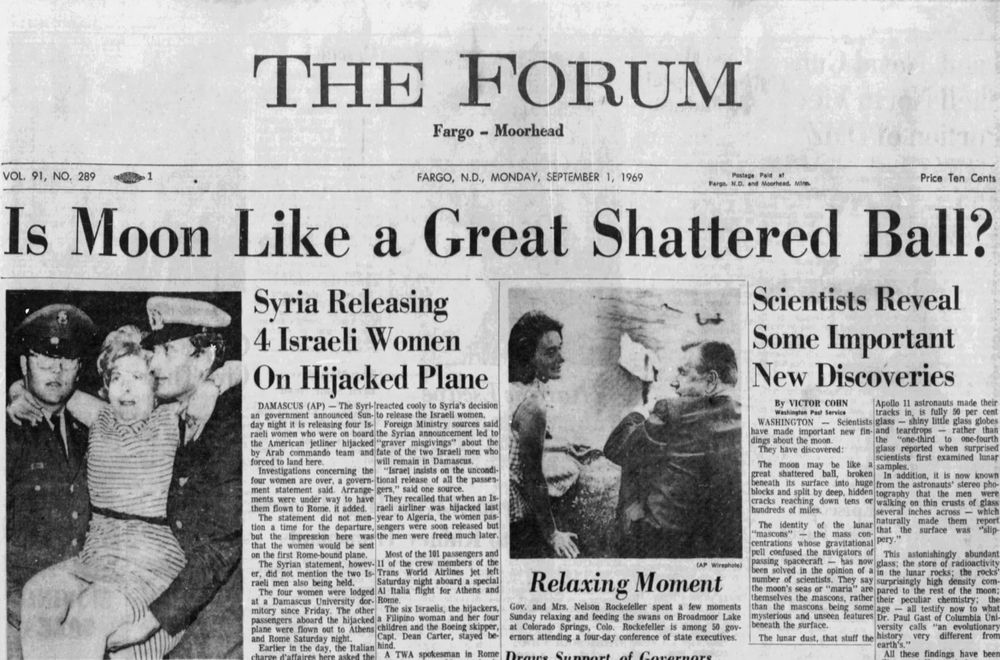 Newspaper, front page with several stories and photos