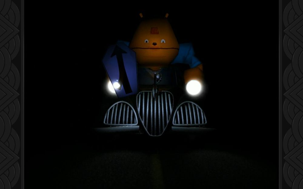 Glottis, a hulking orange thing, in a very small car.  