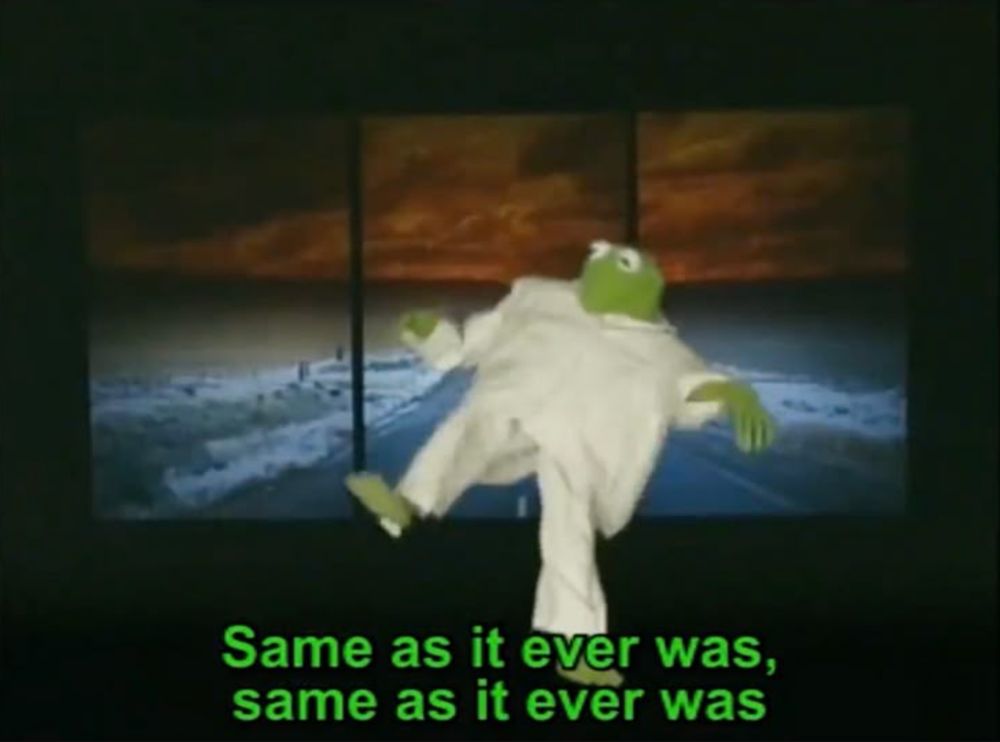 kermit the frog dressed as david byrne, singing "same as it ever was, same as it ever was"