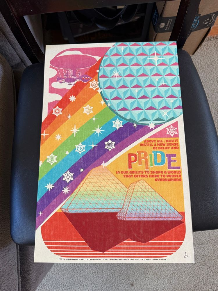 An art print featuring Spaceship Earth, a rainbow with the old Epcot logos, and the imagination pyramids. I cannot do it justice. 