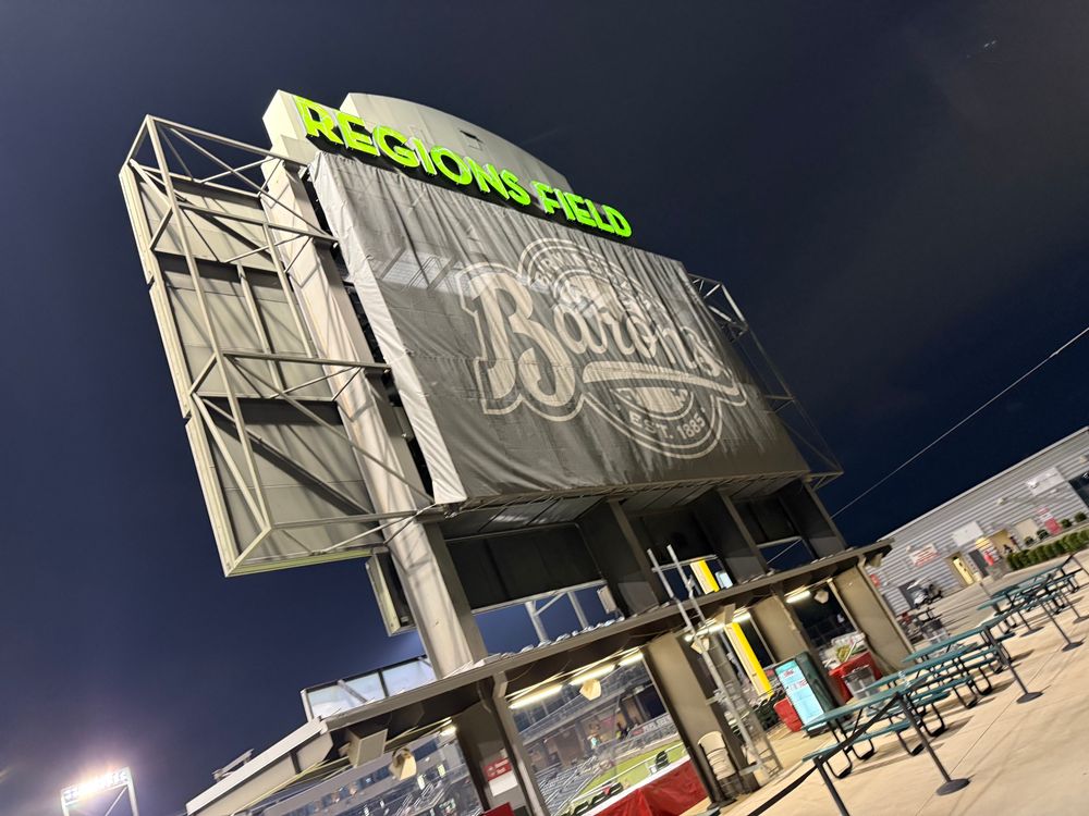The back of a scoreboard at Regions field that says “barons”