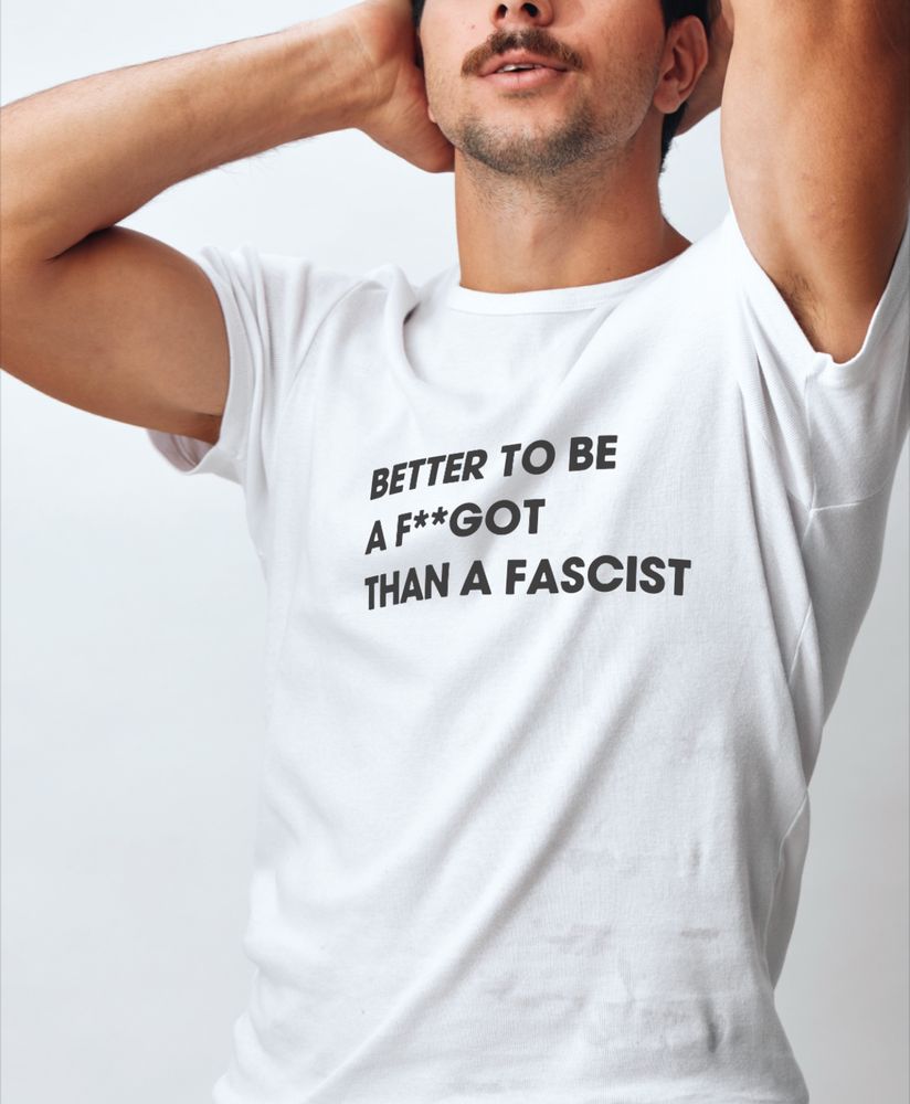 A shirt reads “better to be a faggot than a fascist.”