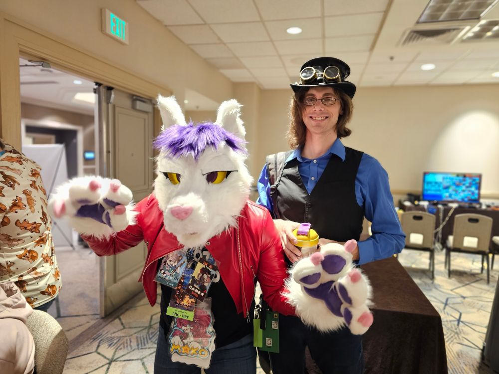 A picture of my local Denver friends. I've is a wolf the other in steam punk.