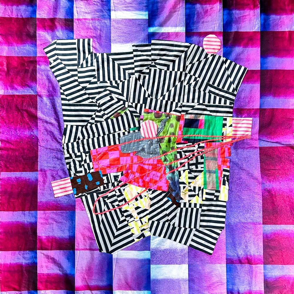 Abstract quilt top with black and white stripes on a purple-blue soft grid background. 