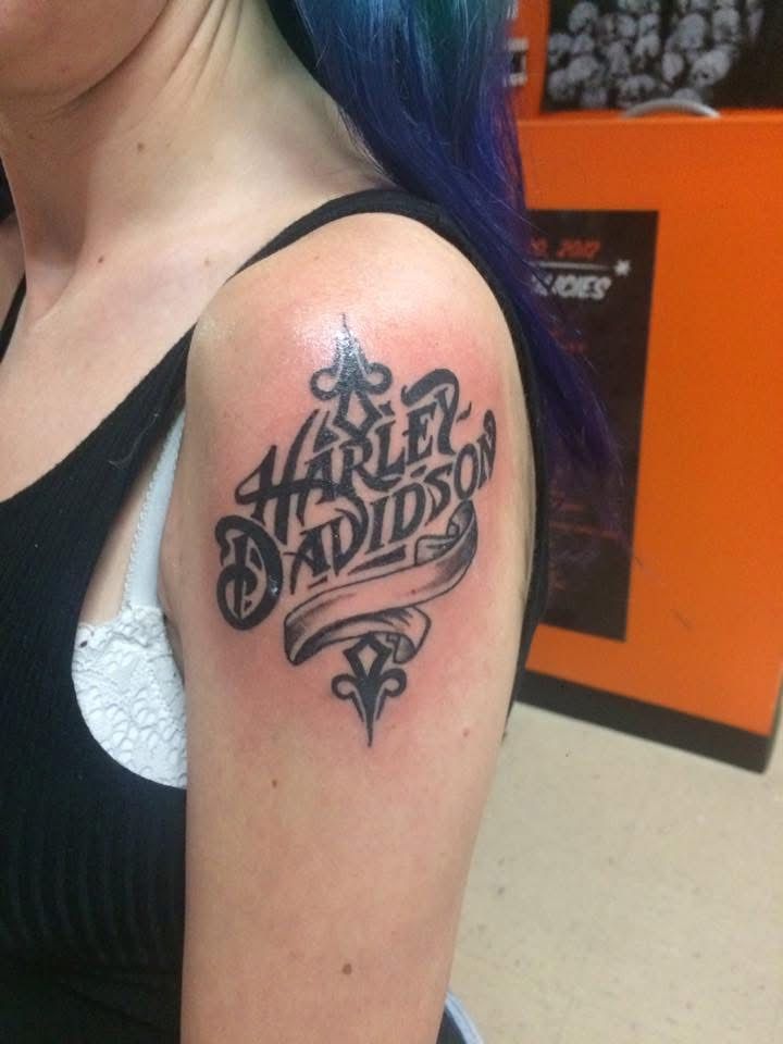 a harley davidson tattoo on my left shoulder