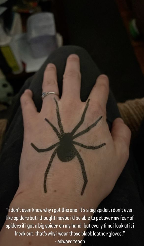 my hand with ed’s spider tattoo. has since been replaced with a real spider tattoo