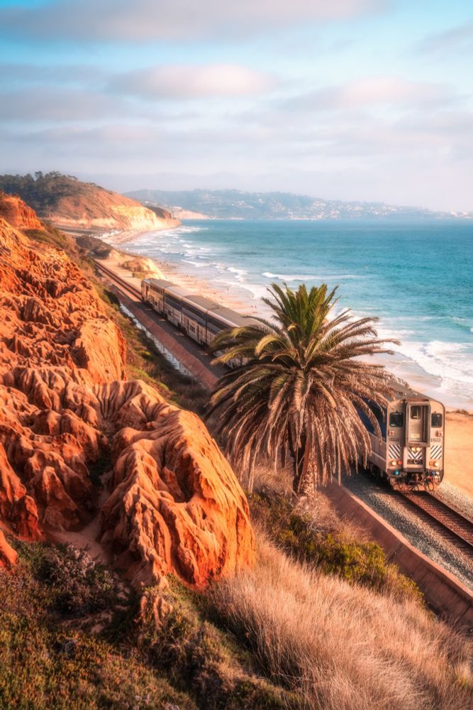 A photo off the coast of La Jolla with a train in the foreground.
