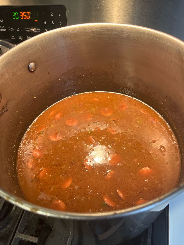 A pot of brownish liquid with chunks in it. 

It doesn’t look particularly appetizing, but it is comforting to the maximum.