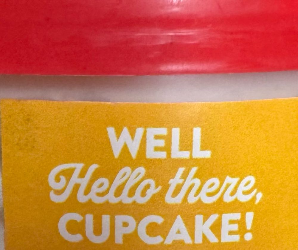 Picture shows the top of a red cap on a container of frosting and the words, “well yellow there, cupcake!” Written in white on a yellow background.