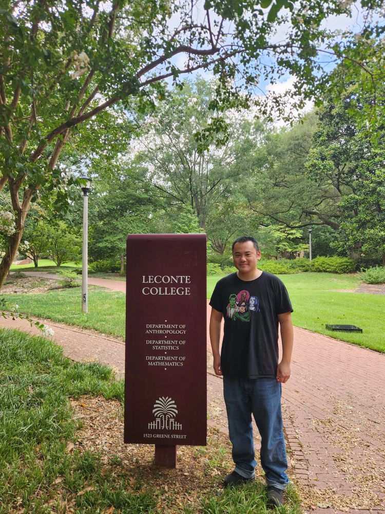 Standing in front of the LeConte College sign (where the USC Statistics Department is located)
