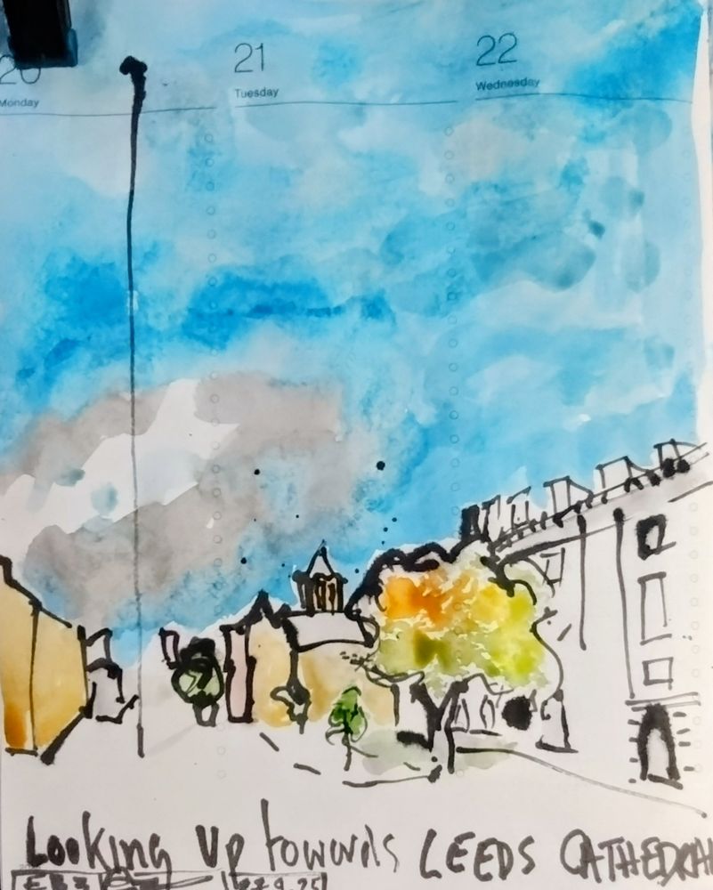 An ink and watercolour sketch of a street looking towards a cathedral in the distance. A large street light stands in the foreground. A big old cloud sits in an otherwise blue sky.
