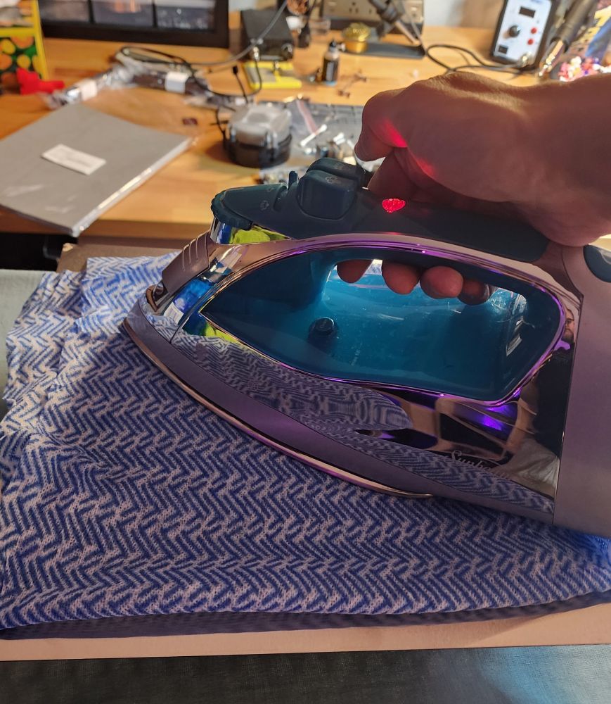 An iron heating up the other side of the plate