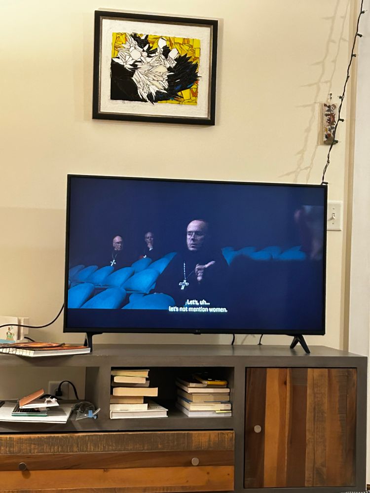 Still from the film Conclave, where cardinal is asking to not mention women. 