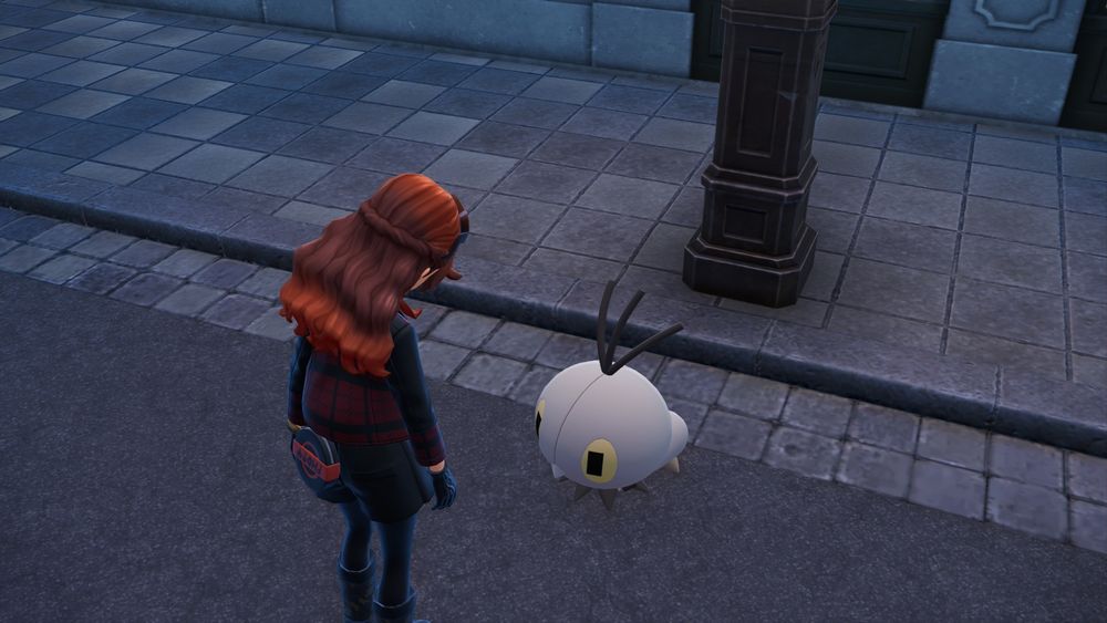 Cherry stares down at the Shiny Alpha Scatterbug in awe and disbelief. 