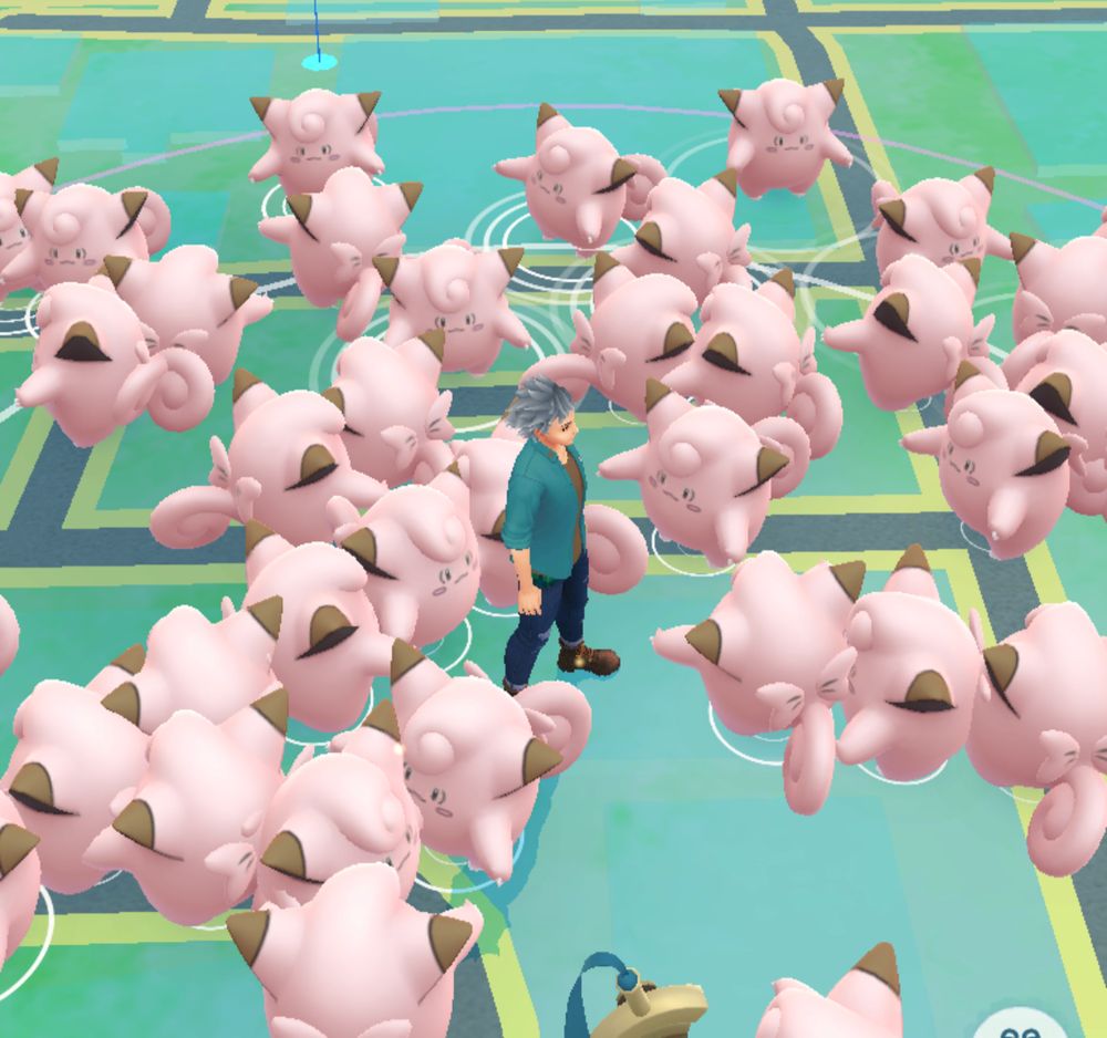 A Pokemon Go screenshot with Clefairies everywhere, literally on too of each other and my avatar in the middle. 